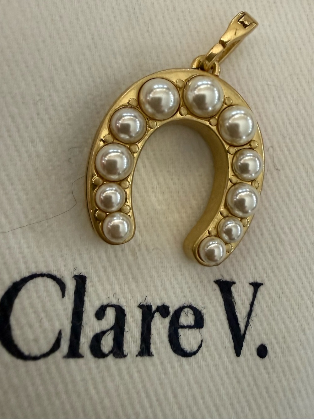Clare V lucky horseshoe charm. Brand new  condition with Clare V white bag. - Picture 2 of 3